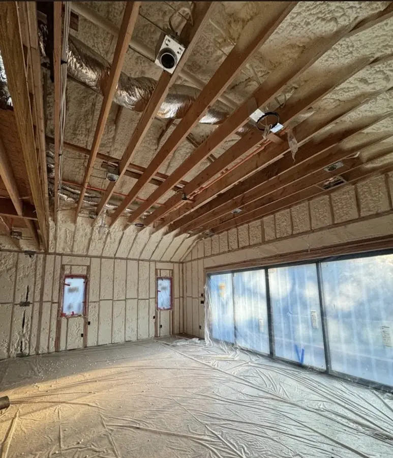 Interior walls and ceiling insulated with spray foam during new construction in Sioux Falls